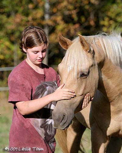 Girl and Palomino Horse